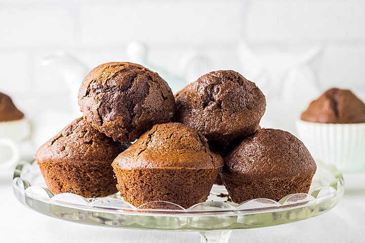 Double Chocolate Chip Muffins piled high on a serving dish