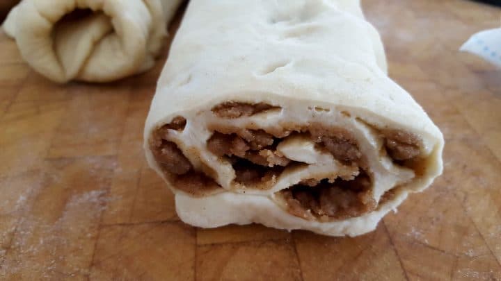 Rolled, filled crumb bun dough with the swirls and filling showing out the end