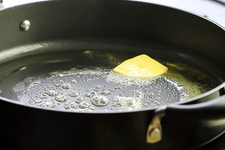 The oil & butter heating in the pan