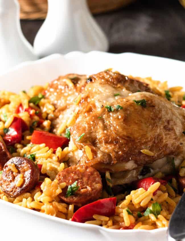 Chicken & Chorizo Paella - Erren's Kitchen - Instead of traditional seafood paella, try a this simple Chicken & Chorizo recipe. This hearty family dinner for four is a flavorful, one pot meal with chicken, Spanish sausage and saffron rice.