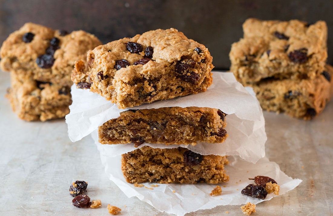 Cinnamon Raisin Oat Bars - Erren's Kitchen - This delightful recipe make an oatmeal cookie bar that's crisp on the outside with a buttery soft center. Best served warm, they are an amazing treat for dessert or even just a snack.