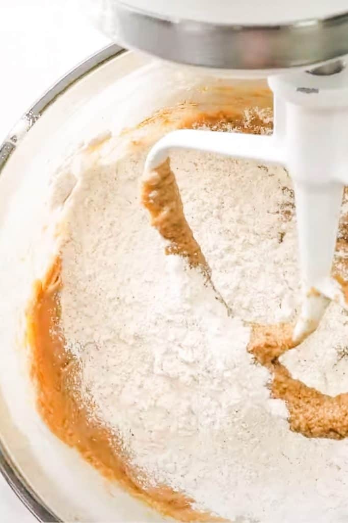 the flour added to the bowl with the egg and butter mixture