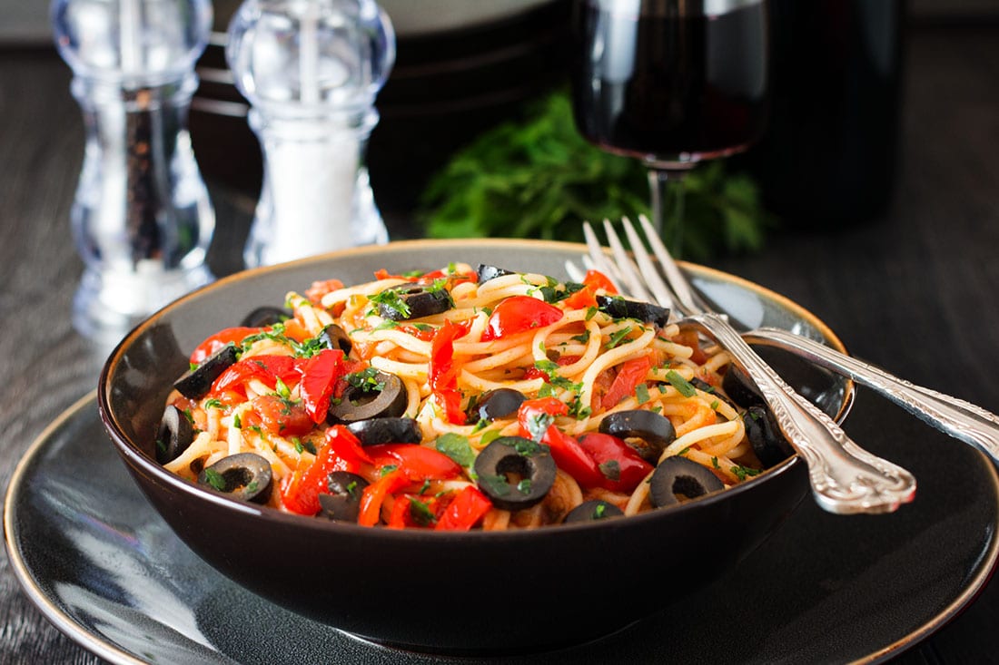 Spaghetti Alla Puttanesca - Erren's Kitchen - This recipe is a quick and easy pasta dish for all the family that uses items you can keep in your pantry so it's easily whipped up in a pinch.