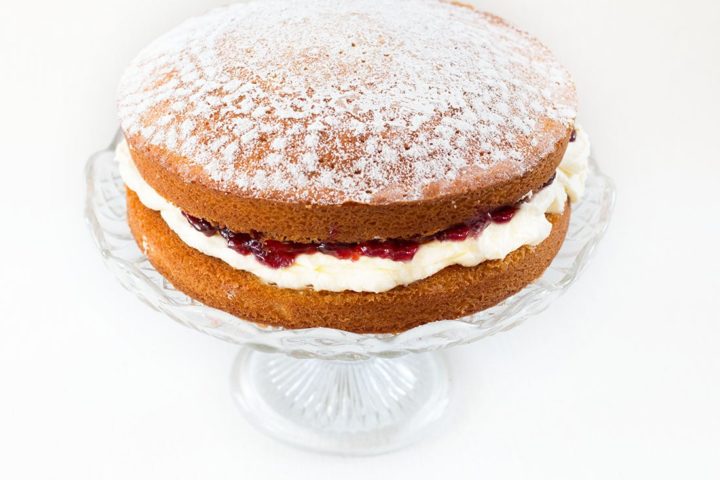 Classic Victoria Sponge Cake - Erren's Kitchen - This recipe uses the classic ingredients of vanilla sponge cake, fresh whipped cream and raspberry jam. Whether you're serving it for a special occasion or just to satisfy a craving, You can't go wrong with this perfect cake.