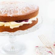Classic Victoria Sponge Cake - Erren's Kitchen - This recipe uses the classic ingredients of vanilla sponge cake, fresh whipped cream and raspberry jam. Whether you're serving it for a special occasion or just to satisfy a craving, You can't go wrong with this perfect cake.