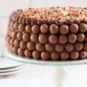 Chocolate Lovers Dream Cake - Erren's Kitchen - Indulge yourself with this amazing recipe. This heavenly moist, fudgy chocolate cake is filled with dark chocolate pudding, covered with chocolate butter cream, a layer of malted milk chocolate balls and topped with a layer of chocolate curls. Its any chocolate lover's dream cake.