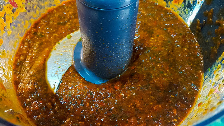 The curry paste pureed in the bowl