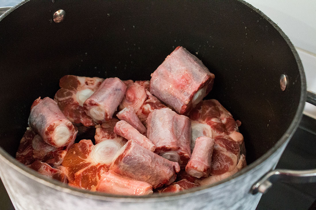 beef in a large cooking pot