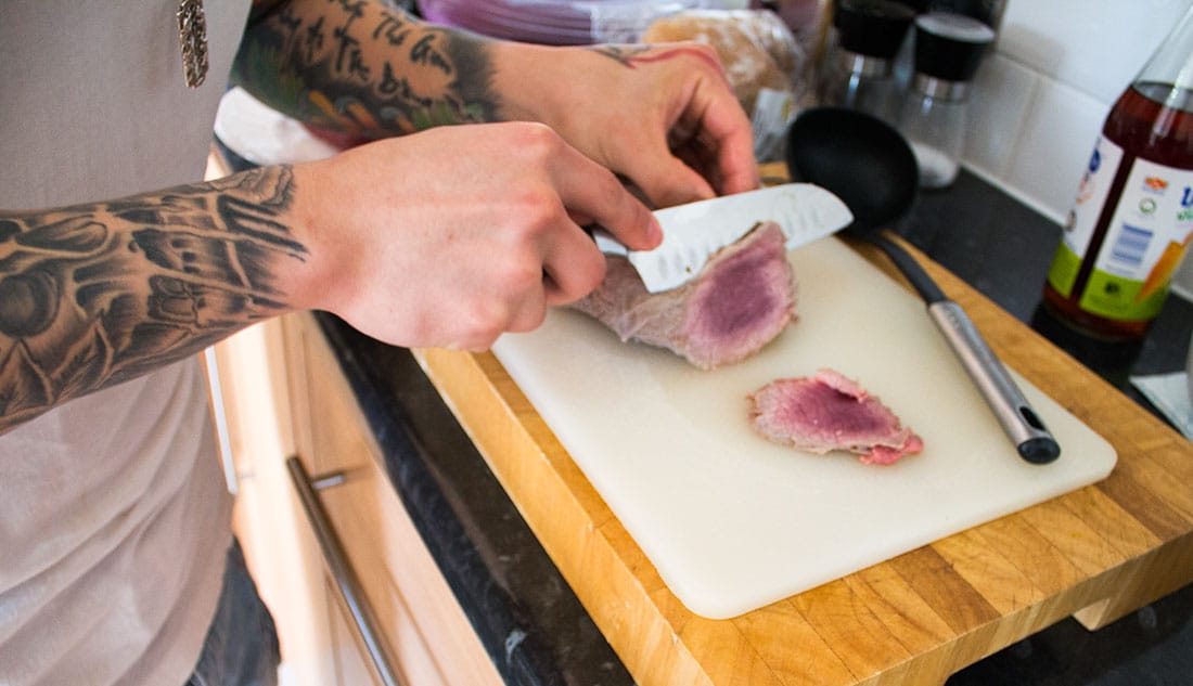 Tuan slicing the joint of beef