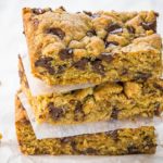 Three Chocolate Chip Oatmeal Cookie Bars stacked on top of each other.