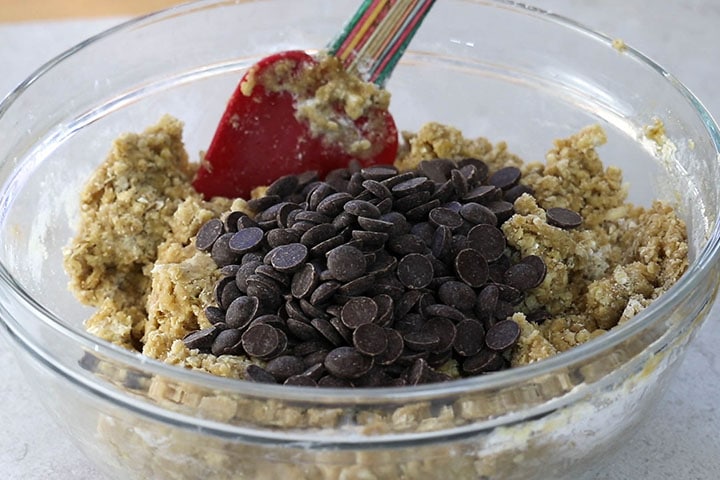 The chocolate chips added to the bowl.