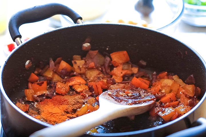 The spices added to the pan with the vegetables