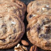 This recipe for Nutty Chocolate Chip Cookies has peanut butter, hazelnut spread, and three types nuts added to the dough to make one fantastic cookie!