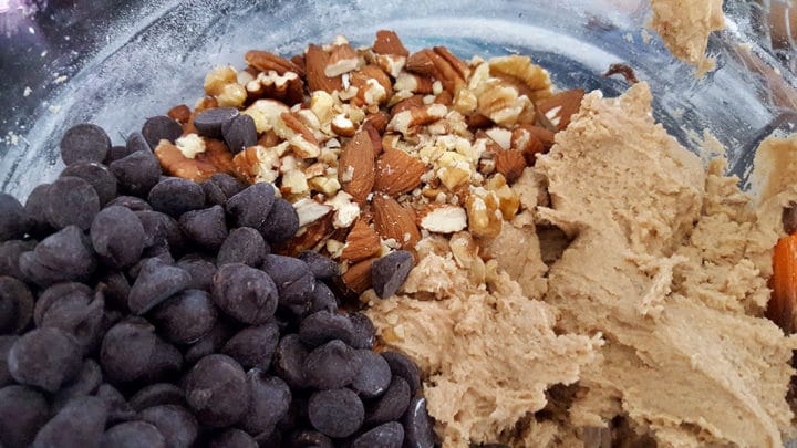 chocolate chips, chopped mixed nuts and peanut butter in a mixing bowl