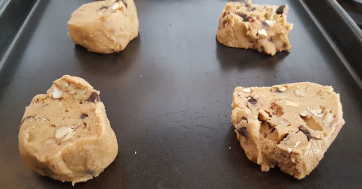 balls of cookie dough on a baking tray