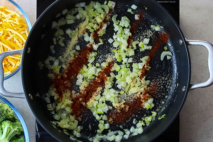 The paprika and garlic powder added to the pan with the onions and celery