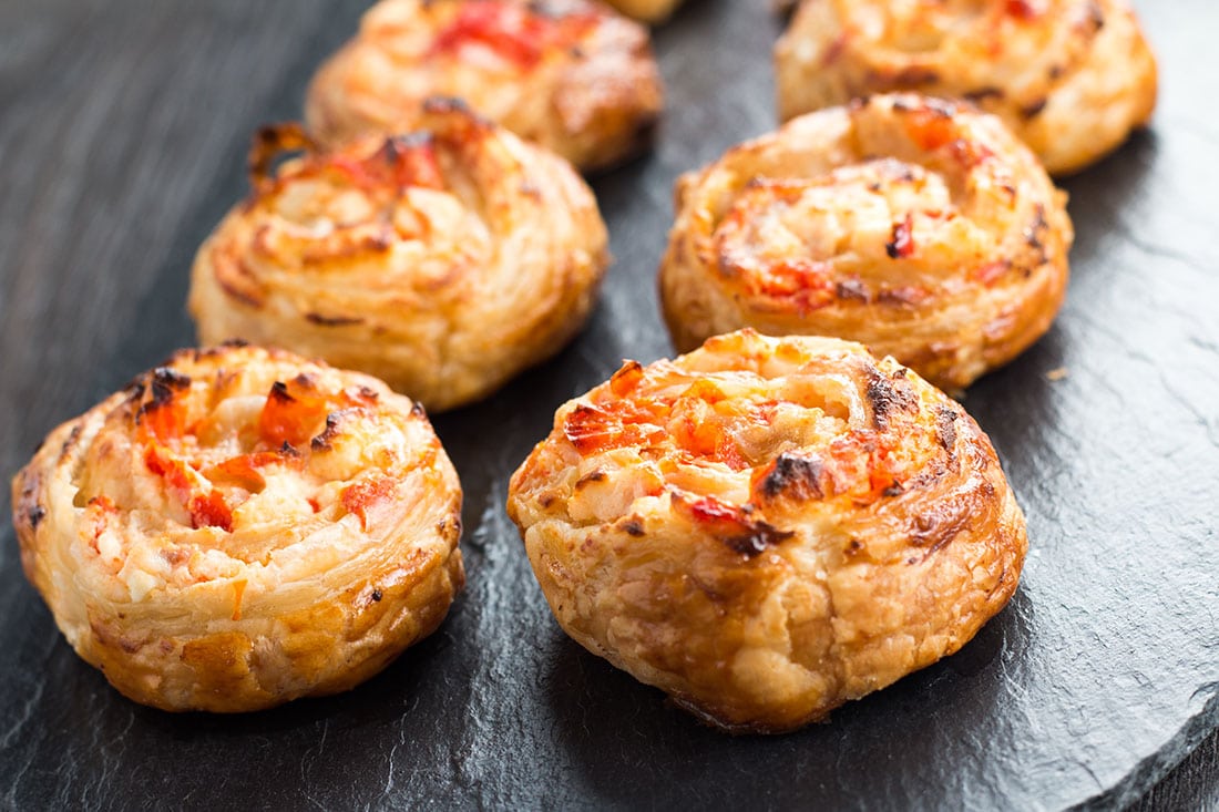 This simple recipe for Feta & Sweet Pepper Pastry Swirls is perfect for the holidays, dinner parties or just as an everyday snack. 