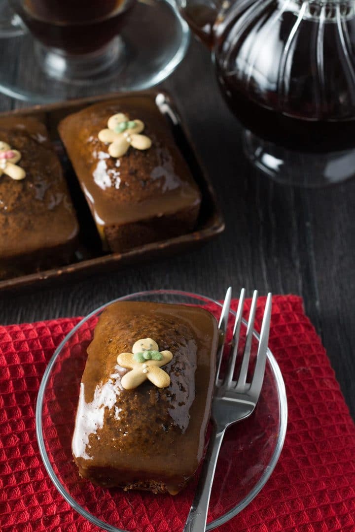 A Sticky Toffee Ginger Cake covered with the toffee glaze and decorated with a little gingerbread man