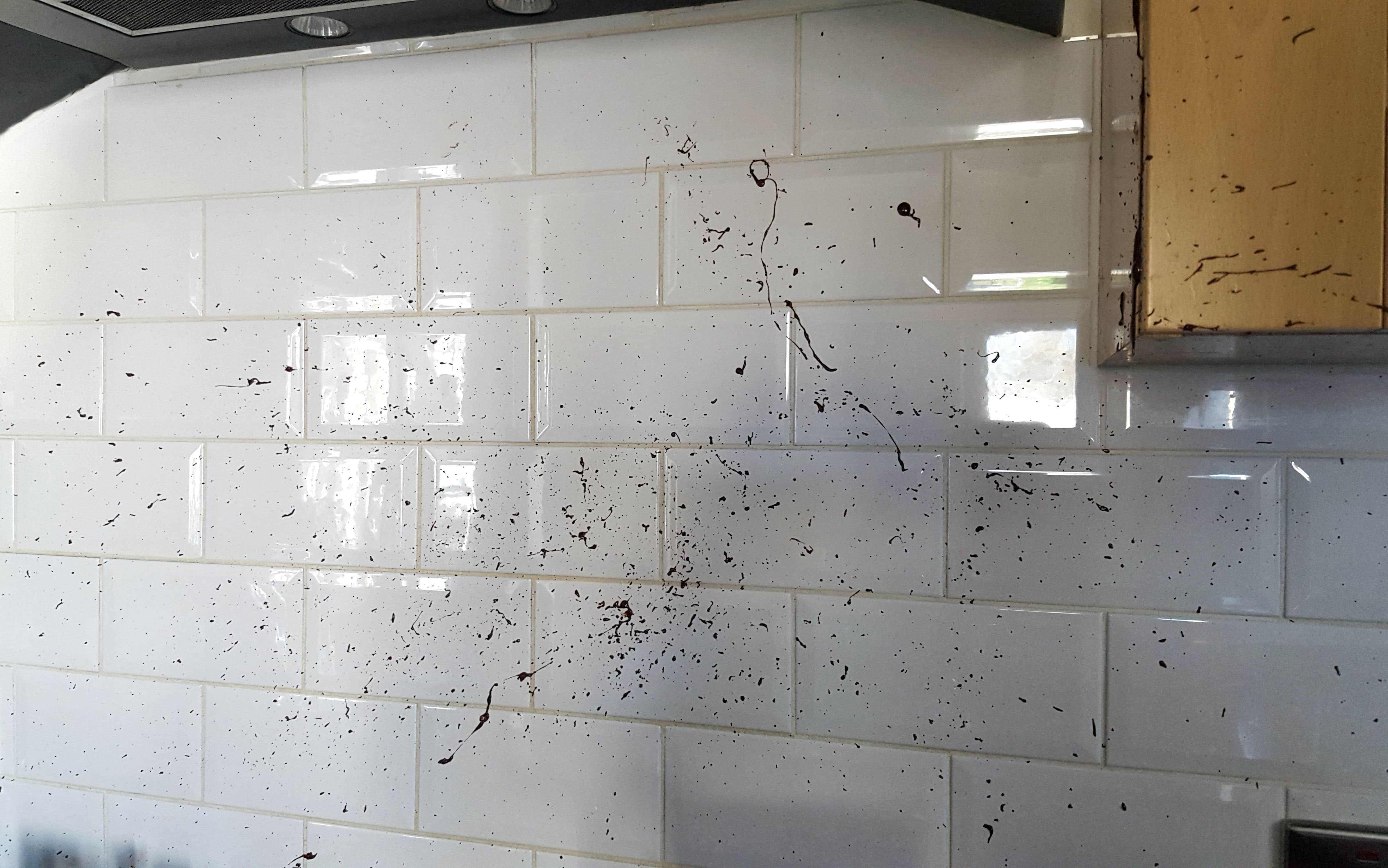 chocolate splashes on kitchen tiles