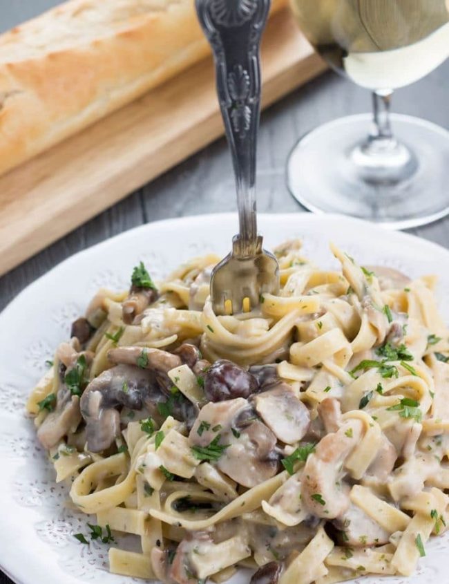 This recipe for Creamy Tagliatelle and Mushrooms makes a mouthwatering pasta dish using cremini mushrooms, fresh parsley, white wine, garlic and butter - what are you waiting for?