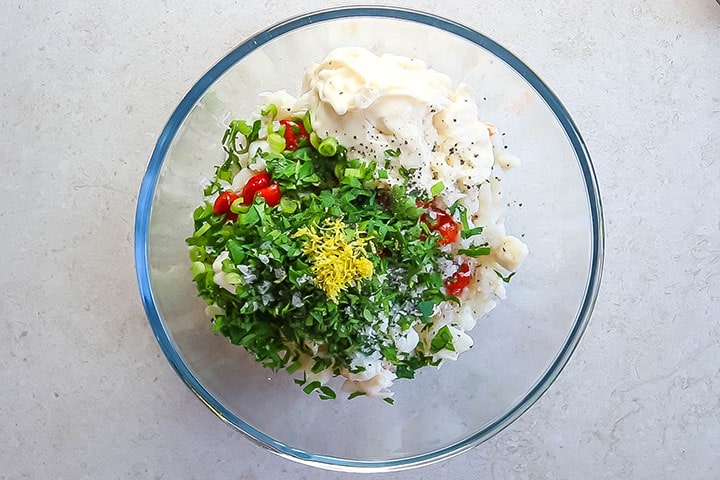 The seasoning added to the bowl with the crab mixture