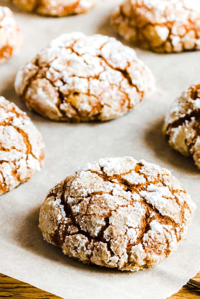 freshly baked Spiced Ginger Crinkle Cookies on a baking Tray