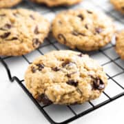 baked chocolate chip oatmeal cookies on a rack