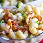 a bowl of pasta salad with bacon