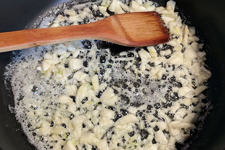 Garlic cooking in olive oil