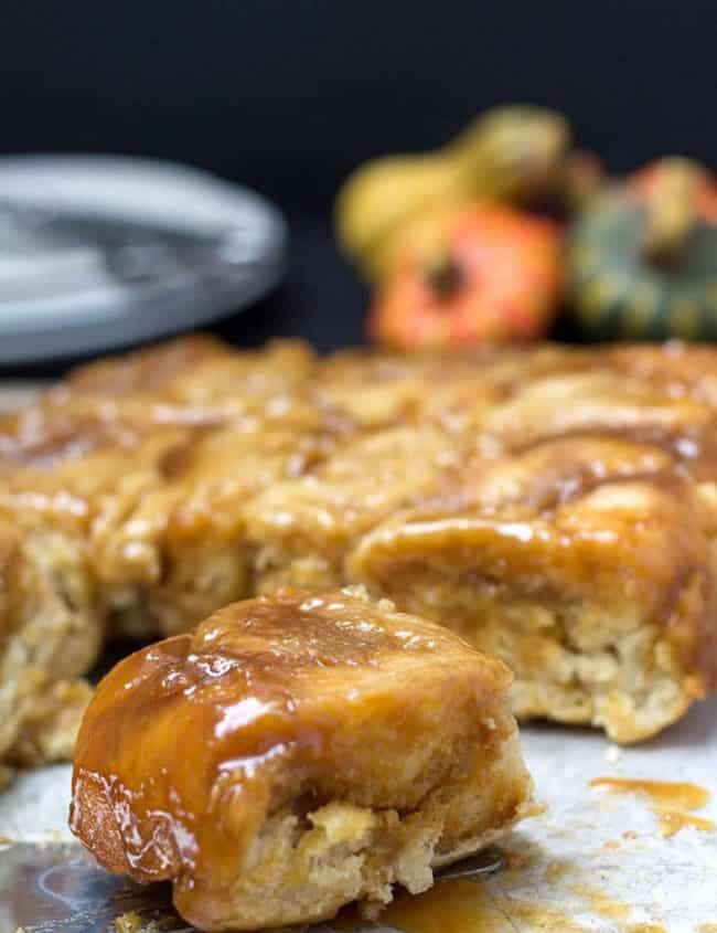 Pumpkin Pie Sticky Buns in a pan with one set aside