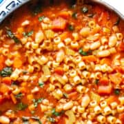 a close up image of Pasta Fagioli Soup in a large pot.