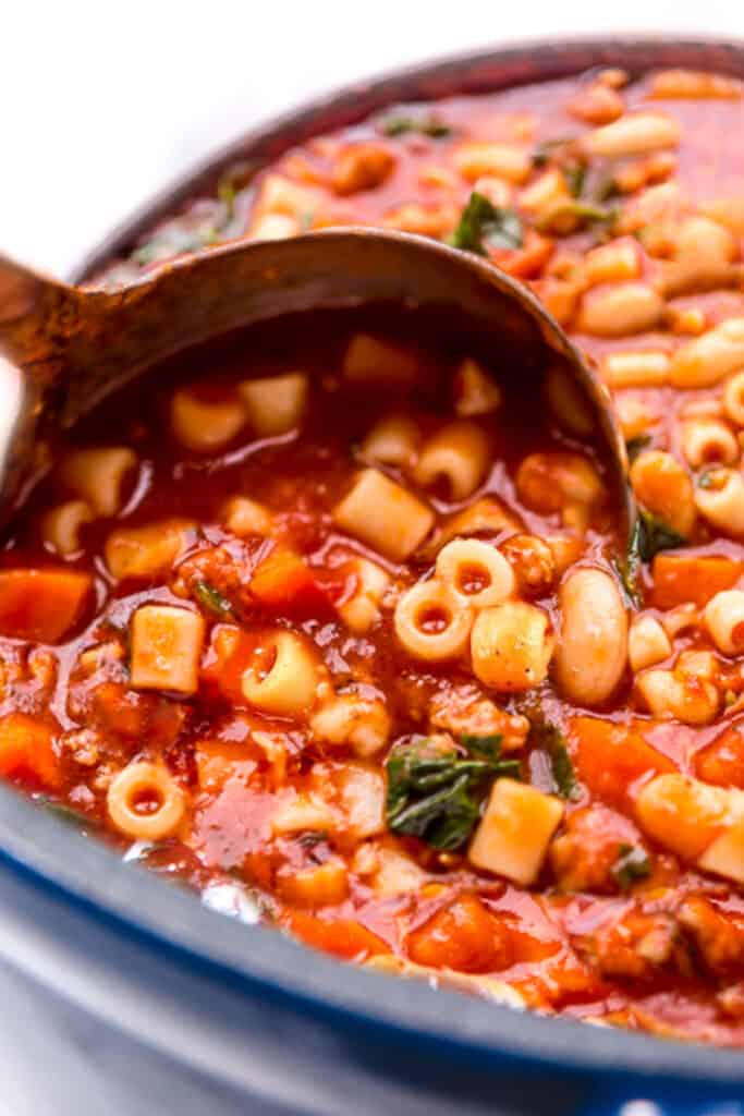 pasta e fagioli soup with  a ladle