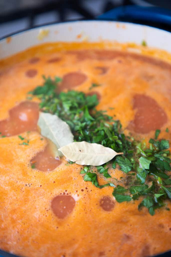 parsley added to pasta e fagioli soup mixture.