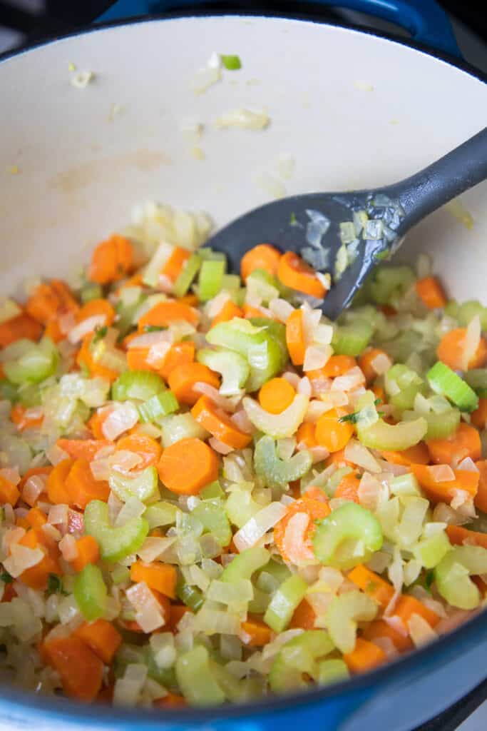 diced carrot, celery and onion in a pan