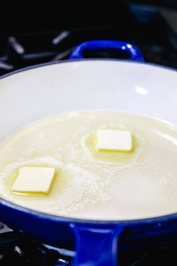 butter and olive oil melting together in a pan