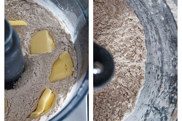 a close up of a food processor bowl with cubed butter laying in the dry ingredients and another with it mixed into small clumps