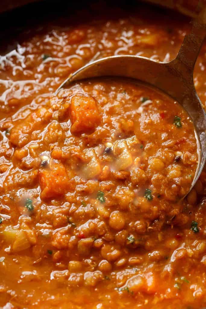 the cooked lentil soup in the pot ready to serve