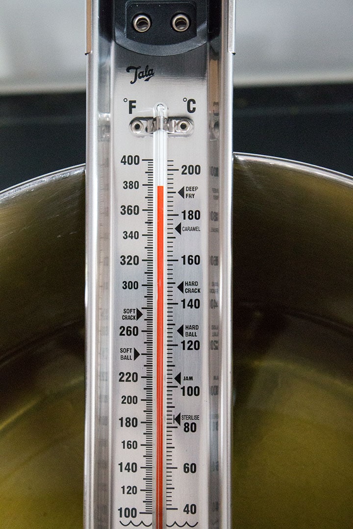 A thermometer in a pot showing 380 degrees Fahrenheit