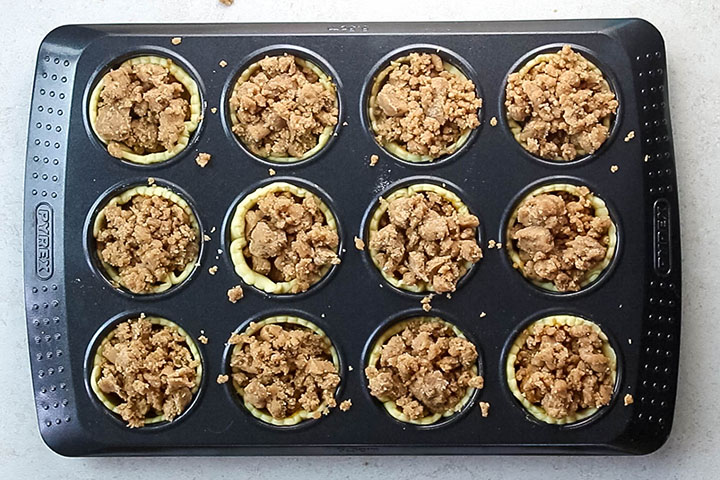 The pan with the pumpkin filled shells and crumb topping