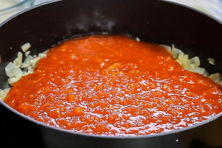 The tomatoes added to the pan