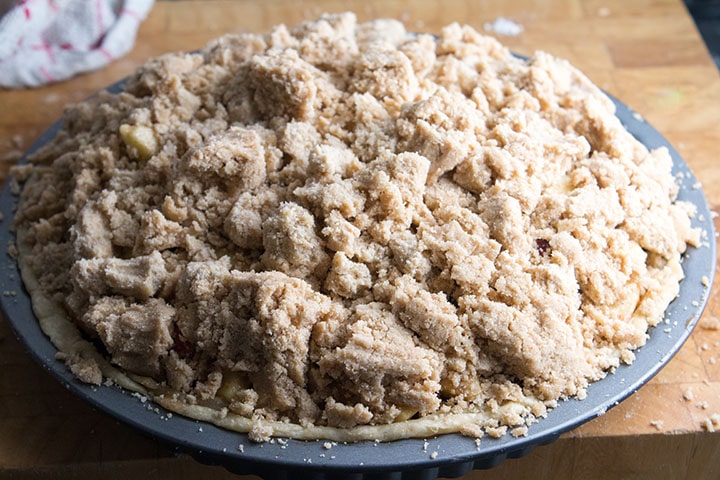 The crumb topping piled high on top of the apple cranberry filling