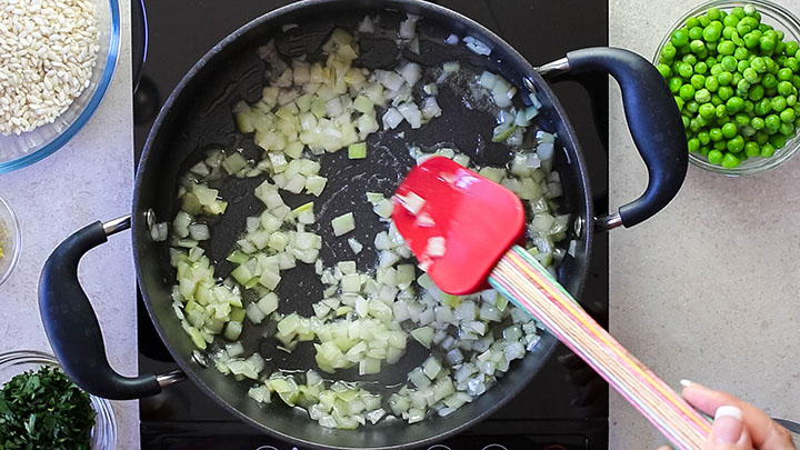 chopped onions sauteing in butter and olive oil