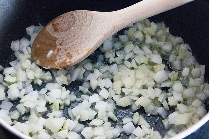 Chopped onions sauteing in olive oil