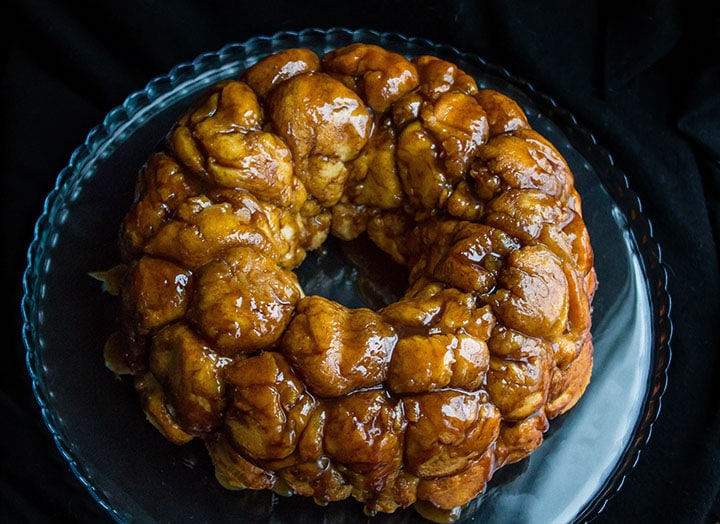 A close up of monkey bread on a serving plate