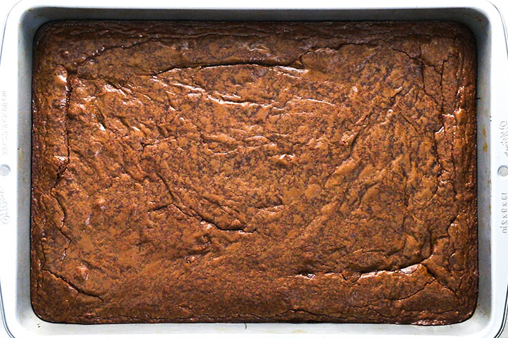 The baked brownies still in the pan