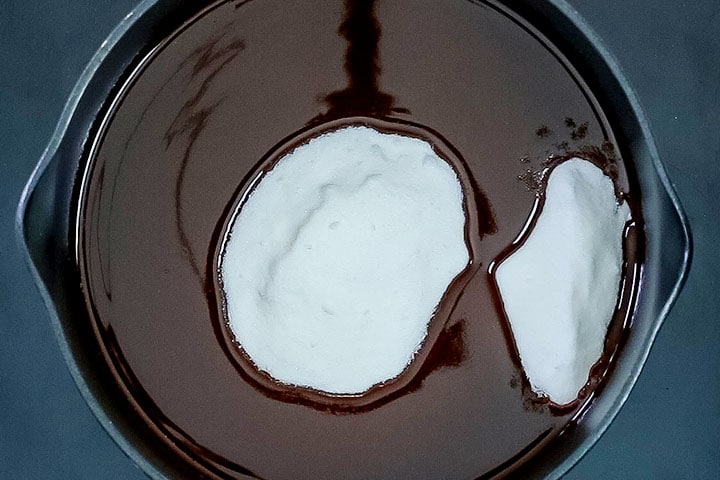 The sugar added to the pan with the chocolate mixture