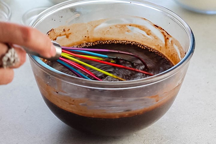 A bowl with the cocoa powder and water mixture