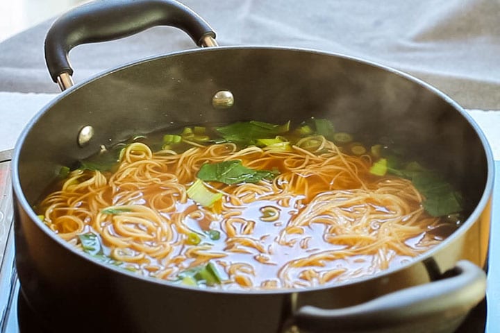 The cooked soup in the pot ready to serve