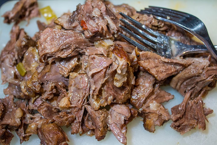 the meat removed from the bones ready to be added to the soup