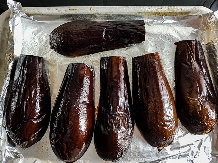 The roasted eggplant still in the pan